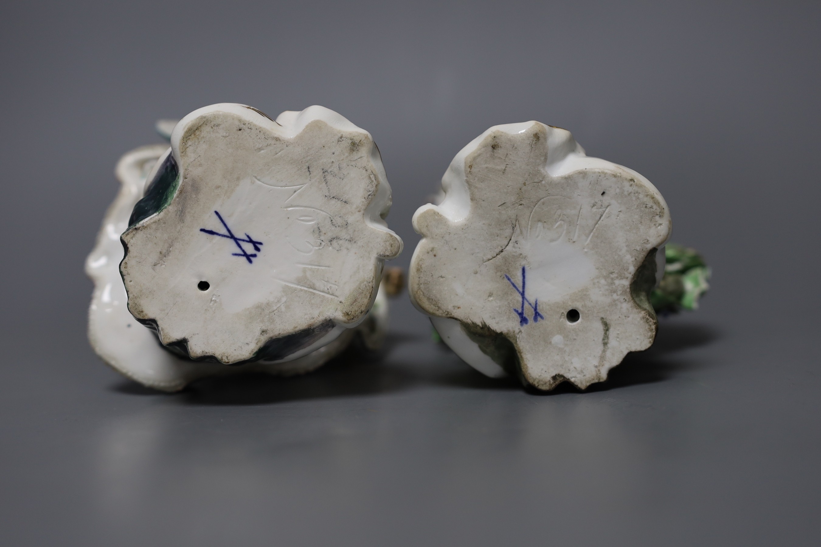 A pair of Derby figures of dancers, both elegantly dressed, incised N317 and blue crossed swords mark to base, tallest 19cm